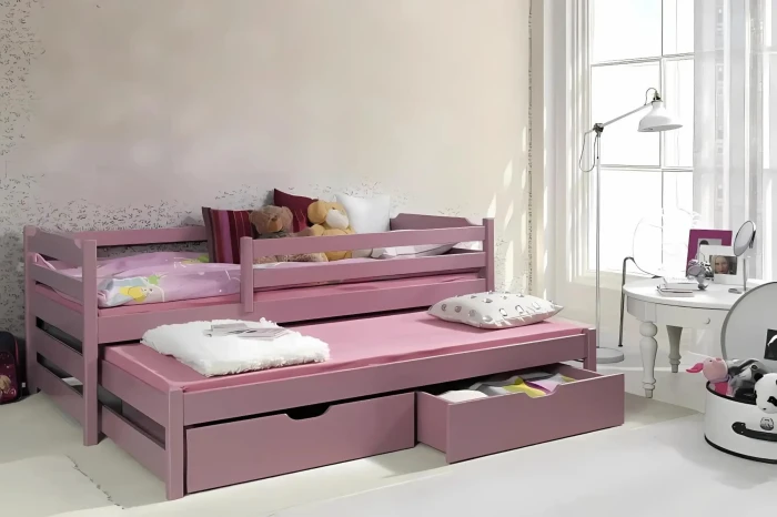 Rosa Kinderbett mit Ausziehbett und zwei Schubladen aus Massivholz für das Kinderzimmer.