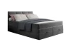 Elegantes dunkelgraues Boxspringbett mit integriertem Stauraum und gepolstertem Kopfteil.