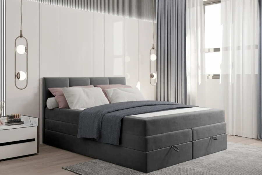 Graues Boxspringbett dekoriert mit Kissen und Decke in modernem Schlafzimmer