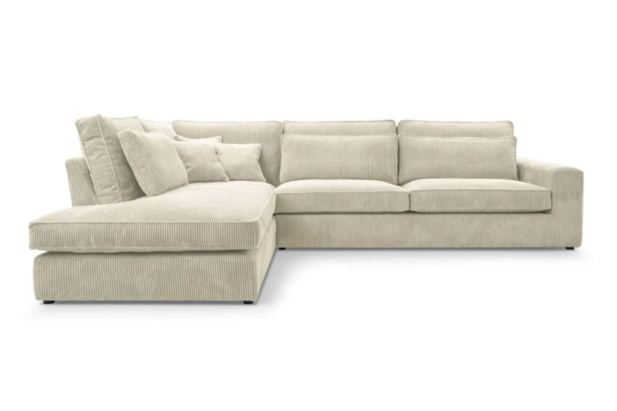 Beiges Ecksofa aus Cord, helle Polsterecke für eine gemütliche Atmosphäre.