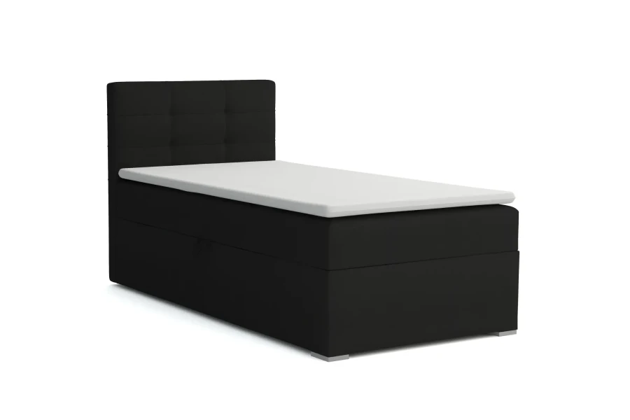 Schwarzes Boxspringbett mit gepolstertem Kopfteil und weißem Topper.