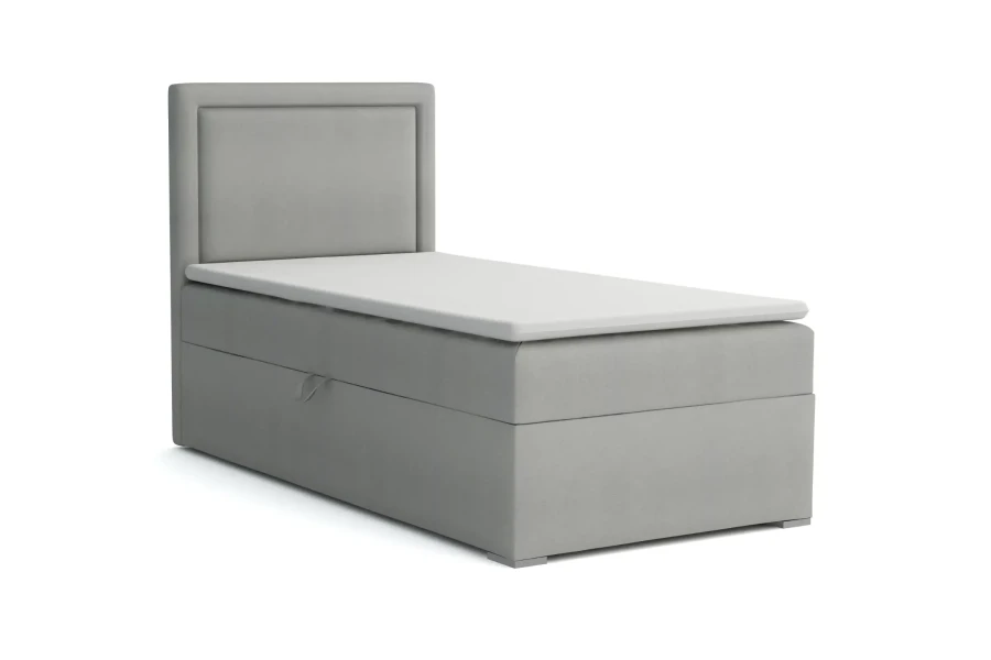 Graues Einzelbett Boxspringbett mit gepolstertem Kopfteil auf weißem Hintergrund.