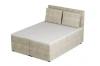 Beiges Boxspringbett aus Cordstoff, Ansicht von schräg oben