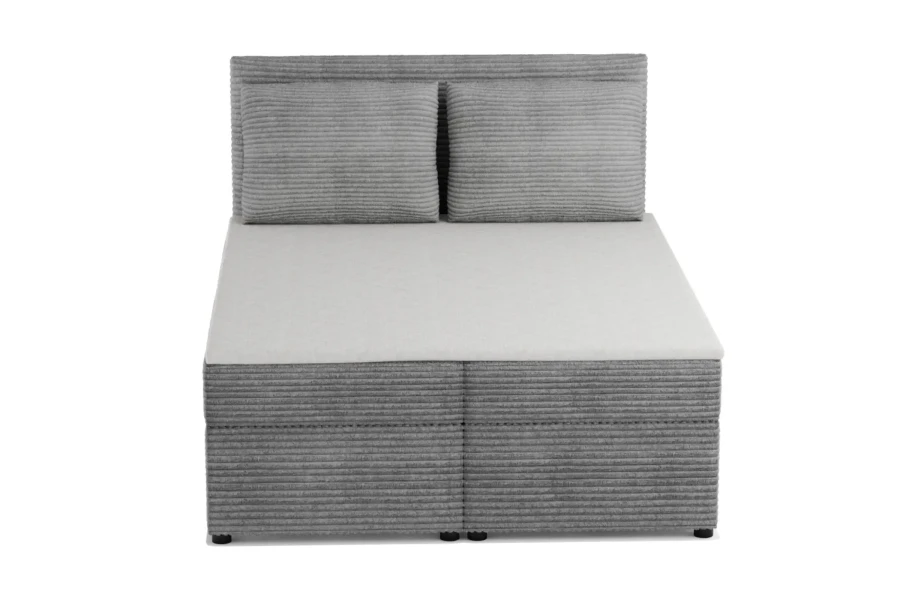 Frontalansicht eines grauen Boxspringbetts mit Cord-Bezug.