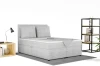 Stilvolles graues Boxspringbett aus Cord im modern gestalteten Schlafzimmer.
