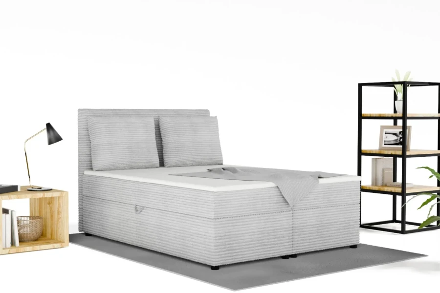 Stilvolles graues Boxspringbett aus Cord im modern gestalteten Schlafzimmer.
