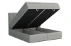 Grijs boxspringbed met geopende bedbakken voor praktische opbergruimte onder het matras.