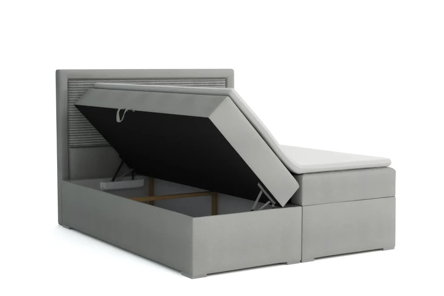 Gecapitonneerd bed in lichtgrijs met open bedbak voor extra opbergruimte en gestreept hoofdbord.