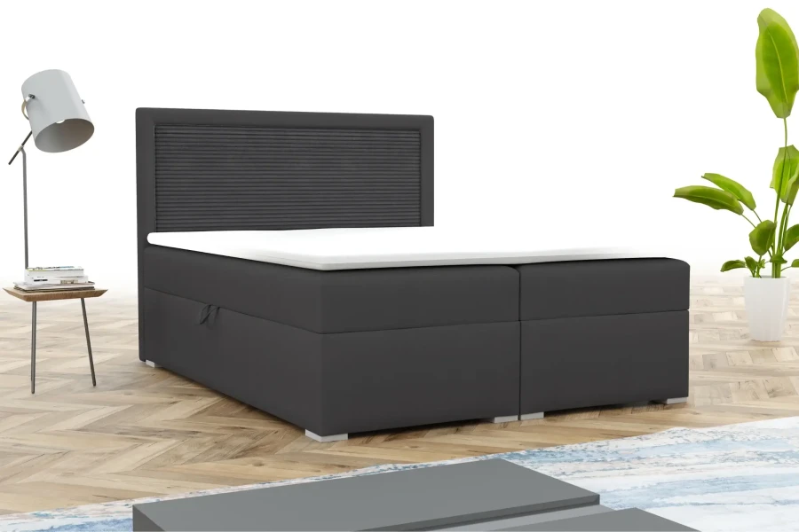 Modern antracietkleurig boxspringbed met gestreept hoofdbord in een lichte slaapkamer.