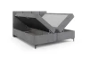 Grijs boxspringbed met twee zijwaarts openslaande bedbakken voor extra opbergruimte.