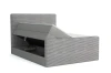 Lichtgrijs boxspringbed van ribstof met geopende bedbak voor extra opbergruimte.