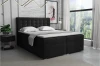 Zwart boxspringbed met gecapitonneerd hoofdbord in moderne slaapkamer