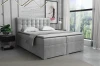 Elegant boxspringbed in grijs met gestoffeerd hoofdbord en topper.