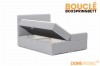 Graues Bouclé Boxspringbett mit praktischem, offenem Bettkasten