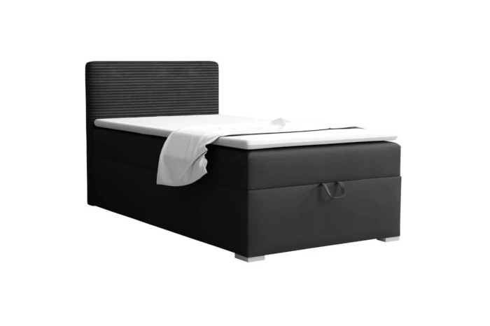 Black box spring bed as a single bed with mattress, topper and padded headboard.