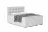 Elegantes Boxspringbett in Weiß mit weichem Kopfteil und schwarz-weißer Tagesdecke