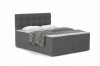 Polsterbett in Anthrazit mit modernem Design und schwarz-weißer Decke.