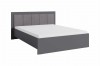 Graues Bett mit gepolstertem Kopfteil und weißer Matratze, modernes Schlafzimmerdesign.