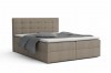 Beiges Boxspringbett mit gestepptem Kopfteil auf weißem Hintergrund.