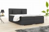 Anthrazitfarbenes Boxspringbett für zeitloses Schlafzimmer-Design.