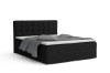 Schwarzes Boxspringbett aus Cord mit gestepptem Kopfteil und grauer Bettgarnitur