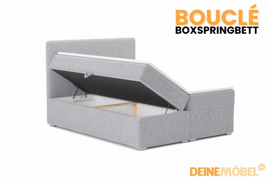 Open bouclé box spring bed with large storage box for practical storage space.