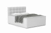 Modern wit boxspringbed met gestoffeerd hoofdbord en decoratieve zwart-witte deken.