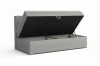 Grijs boxspringbed met geopende bedbak biedt veel opbergruimte voor beddengoed.