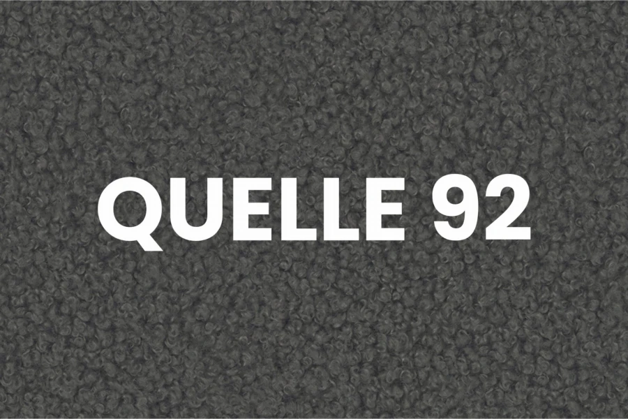 Close-up van de stofstructuur Quelle 92 in donkergrijs voor gestoffeerde meubels.