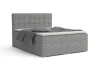 Modern boxspringbed in het grijs met stijlvolle ribstof-bekleding en gestoffeerd hoofdbord voor slaapcomfort.
