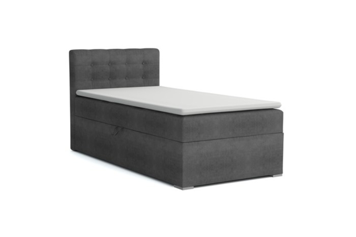 Modernes graues Boxspringbett JUNG III mit gepolstertem Kopfteil und weißem Topper.