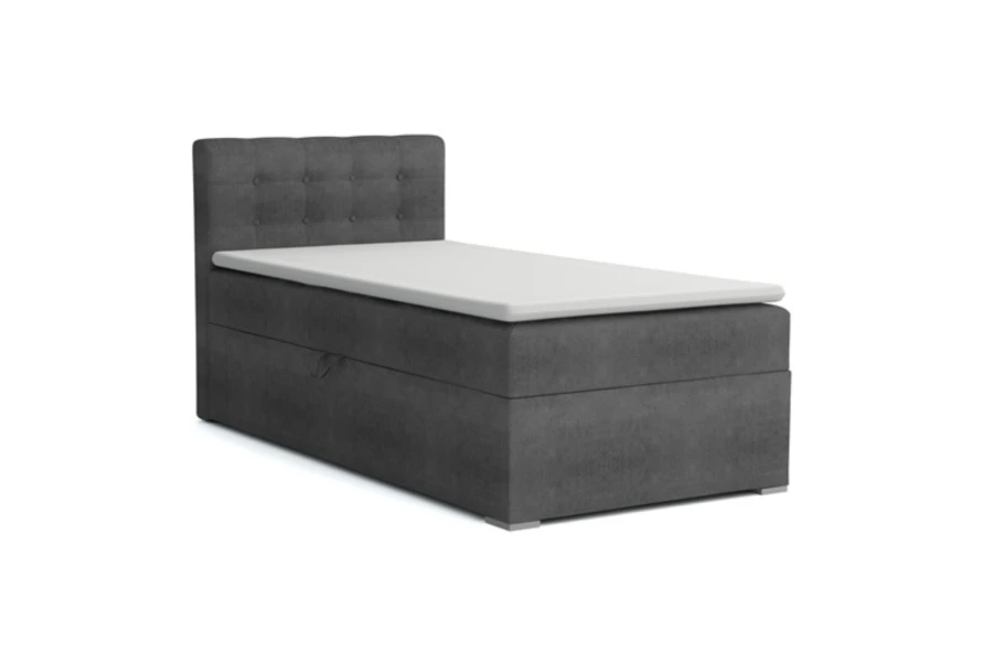 Modernes graues Boxspringbett JUNG III mit gepolstertem Kopfteil und weißem Topper.