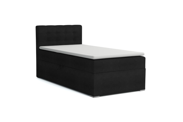 Schwarzes Boxspringbett JUNG III mit weißem Topper und gepolstertem Kopfteil, isoliert auf Weiß.
