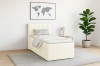 Modernes Boxspringbett Jung III in Creme für Jugendzimmer, inklusive Kopfteil und Topper.