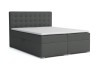 Elegantes anthrazitfarbenes Boxspringbett mit gestepptem Kopfteil auf weißem Hintergrund.