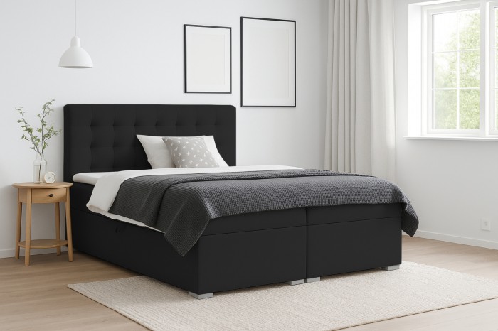 Elegant zwart boxspringbed met hoog hoofdbord in een moderne slaapkamer.