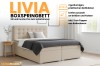 Livia boxspringbed in beige met praktische opbergboxen en topper voor de slaapkamer.