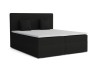 Schwarzes Boxspringbett mit weißem Topper und zwei Zierkissen vor weißem Hintergrund.