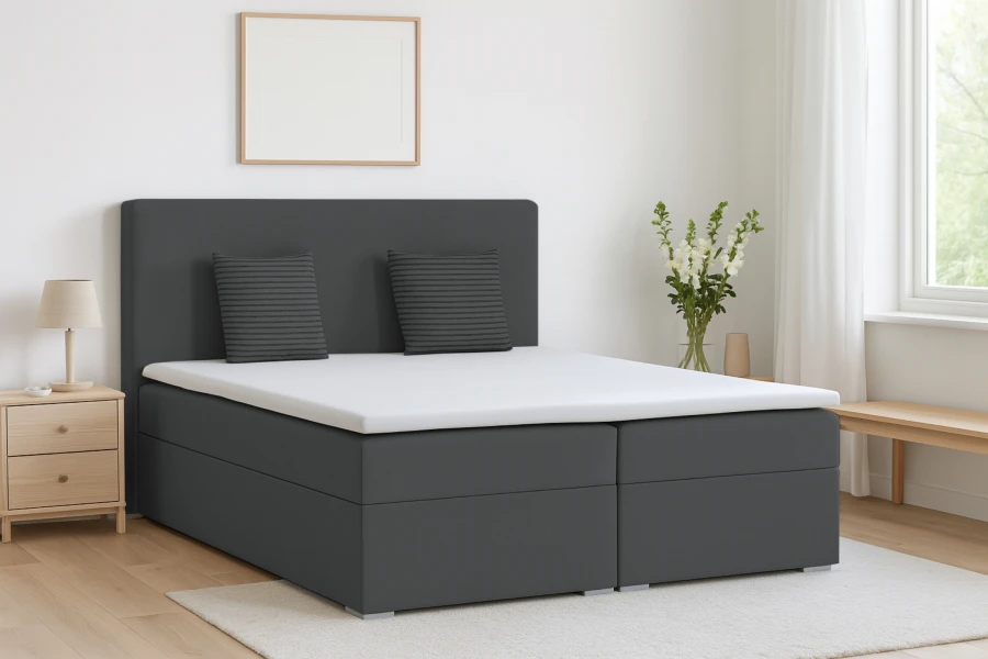 Elegantes Boxspringbett in Anthrazit für ein modernes Schlafzimmer-Design.