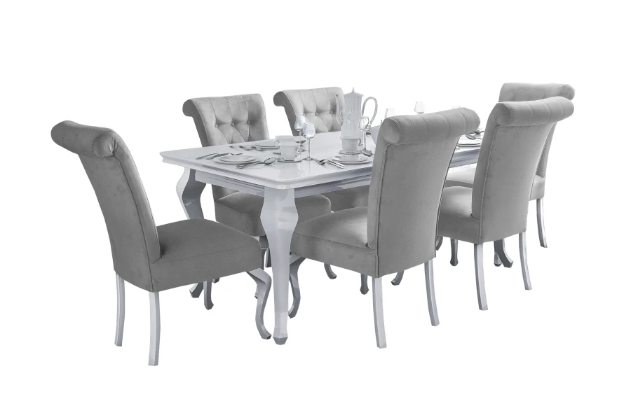 Moderne Essgruppe Luise mit weißem Tisch und 6 grauen Samtstühlen.