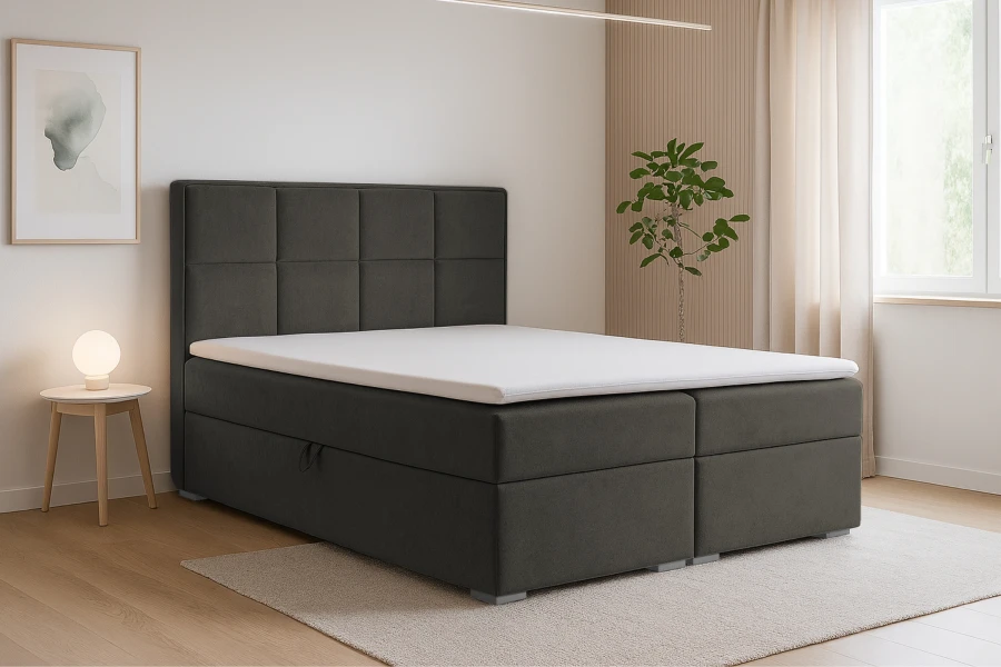 Modernes anthrazitfarbenes Boxspringbett mit gepolstertem Kopfteil in stilvollem Schlafzimmer.