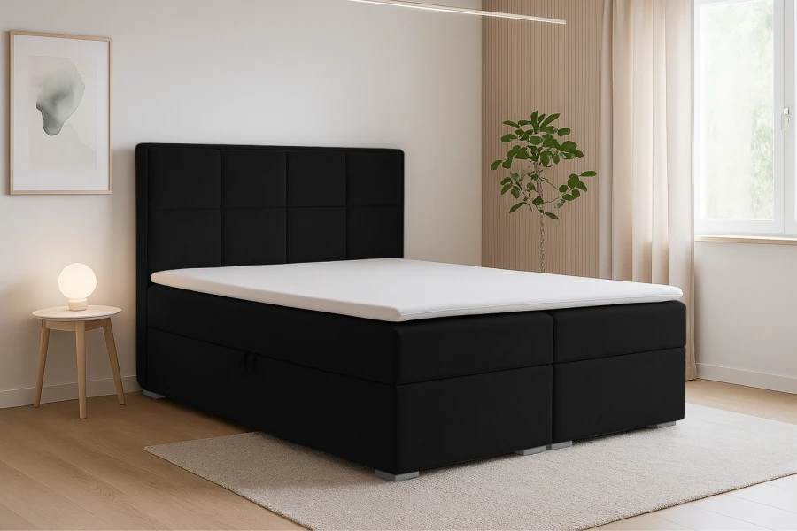 Modernes Boxspringbett in Schwarz mit hohem Kopfteil im Schlafzimmer.
