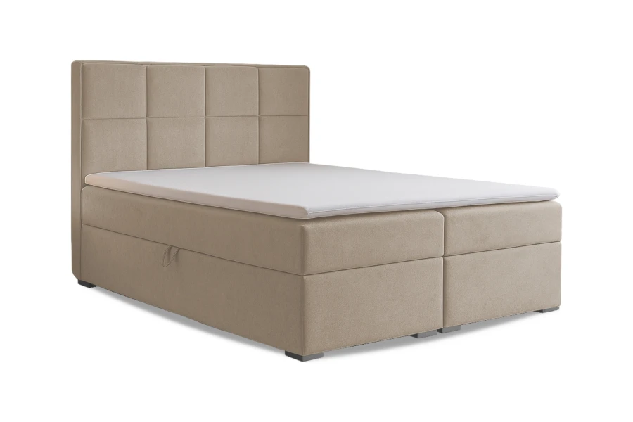 Beiges Boxspringbett mit Bettkasten und gestepptem Kopfteil auf weißem Hintergrund