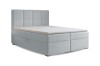Hellblaues Boxspringbett mit integriertem Stauraum und weißem Topper