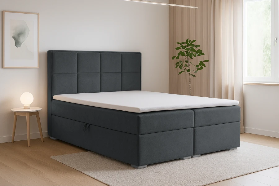 Boxspringbett in Dunkelgrau in einem modern eingerichteten Schlafzimmer.
