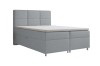 Stilvolles graues Boxspringbett mit hohem Kopfteil und Topper vor weißem Hintergrund.