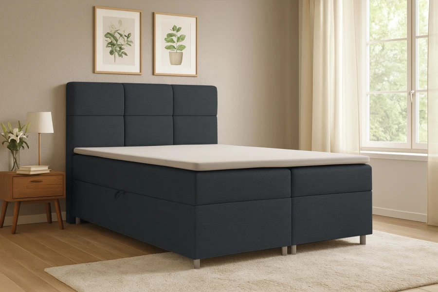 Dunkelgraues Boxspringbett Susan in einem gemütlich eingerichteten Schlafzimmer mit Deko.