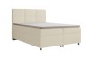 Elegantes beige-farbenes Boxspringbett mit grauem Topper auf weißem Hintergrund.