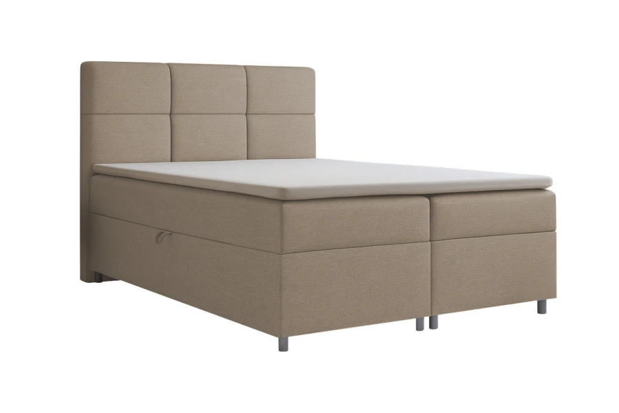 Beiges Boxspringbett mit abgestepptem Kopfteil und integriertem Bettkasten auf weißem Hintergrund.