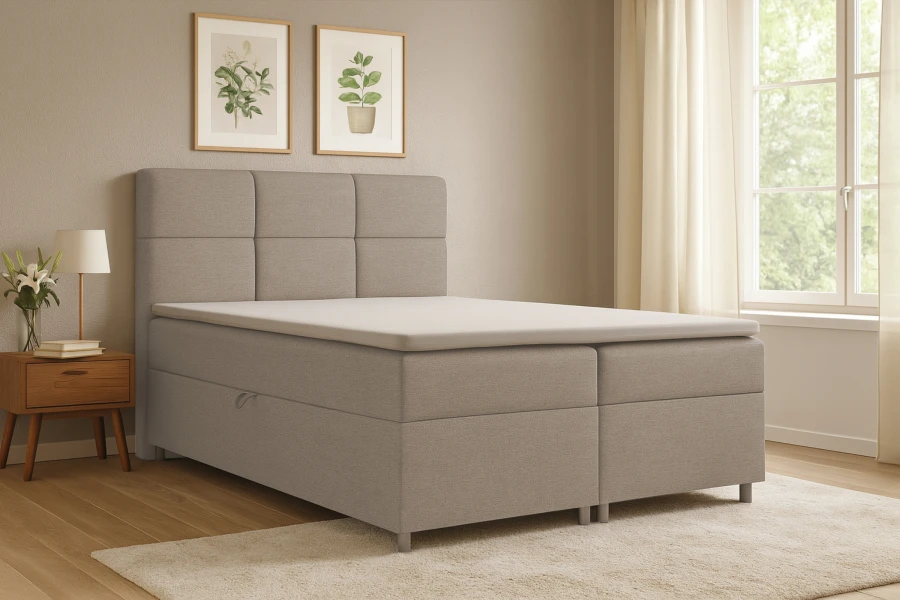 Modern eingerichtetes Schlafzimmer mit beige Boxspringbett, Nachttisch und hellem Fenster.